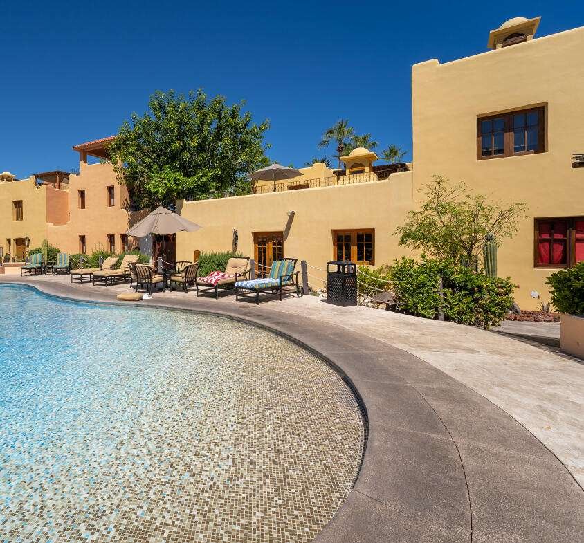 Loreto Founders Nestled in the enchanting coastal community of Loreto Bay, just one home from the pristine shores of the Sea of Cortez, this stunning custom-built residence completed in 2019 embodies the pinnacle of Baja elegance and craftsmanship. No expense was spared in creating this 3-bedroom, 2.5-bathroom masterpiece, designed for seamless indoor-outdoor living amid breathtaking natural beauty. Step through the grand entry into a captivating central courtyard, where meticulous finish details and thoughtful layout immediately captivate. Natural stone flooring flows throughout, complemented by rich granite countertops, handcrafted copper sinks, and bespoke glass light fixtures that evoke traditional Mexican charm with modern sophistication. Accordion doors open effortlessly from living spaces to the courtyard and patios, blurring the lines between indoors and outperfect for enjoying gentle sea breezes and al fresco dining under starry Baja skies.For the culinary enthusiast, the chef-inspired kitchen is a true highlight: equipped with top-of-the-line appliances, ample prep space, and stylish design that makes entertaining a delight. Host unforgettable gatherings with family and friends, all while soaking in the relaxed vibe of this pedestrian-friendly village.Ascend to the second-level master suite and patio for sweeping panoramic – Calle Collins, Loreto, BS