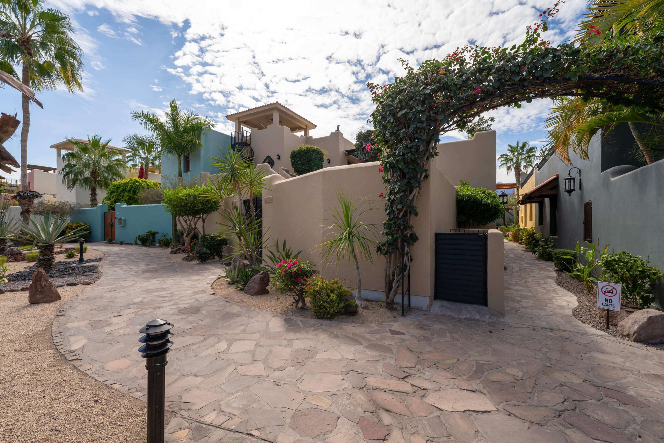 Loreto Founders Welcome to this beautifully renovated custom Bohemia casa in Loreto Bay, Baja California Sur, where modern sophistication meets timeless Mexican charm. This turnkey 3-bedroom, 3-bathroom home offers privacy, natural light, and seamless indoor-outdoor living, with a generous side yard and elegant finishes throughout. The chef's kitchen features granite countertops, Samsung stainless-steel appliances, and ample storage. Designer furnishings, floor-to-ceiling windows, Hunter Douglas window treatments, phantom screens, and updated Kohler fixtures enhance comfort and style. Two spacious primary suites, a third ensuite bedroom, and mountain for sale