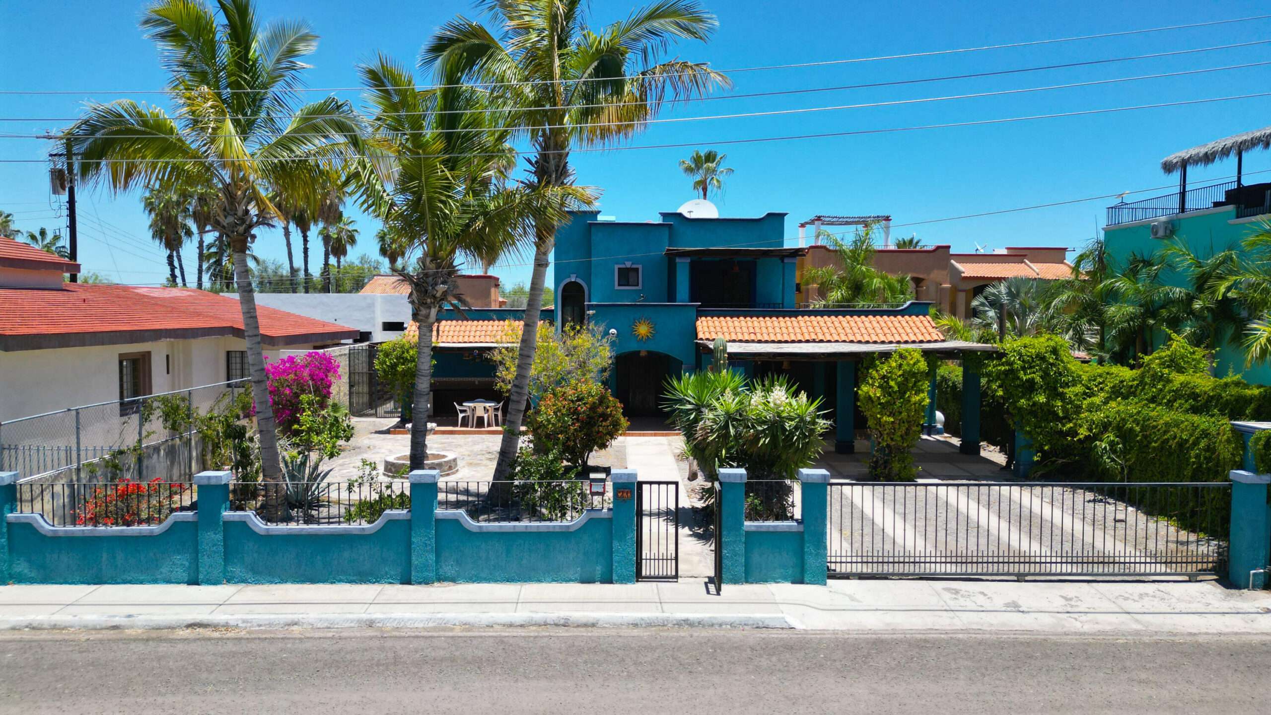 Loreto General Discover a beautiful residence that blends the charm of traditional Mexican architecture with spaces designed for enjoying the outdoor lifestyle. Surrounded by lush palm trees and tropical landscaping, this property offers a private, relaxing atmosphere full of character.The ground floor features a kitchen, living room, dining room, spacious primary bedroom with a full bathroom, a guest half bath, and a laundry area. Upstairs, you'll find two confortable bedrooms that share a full bathroom.The heart of the home is its inviting outdoor living space, complete with a swimming pool, BBQ area, and ample room for entertaining family and friends while enjoying Baja's for sale