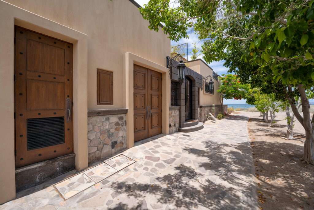 Loreto Founders Stunning beachfront residence in Loreto Bay offering luxury, privacy, and direct access to the Sea of Cortez. This exceptional home features distinctive curved architecture, natural stone finishes, and seamless indoor-outdoor living. Enjoy a resort-style pool and elevated hot tub, expansive oceanfront terrace, outdoor kitchen, and multiple entertaining areas with breathtaking sea – Founders 11, Loreto, Loreto, BS