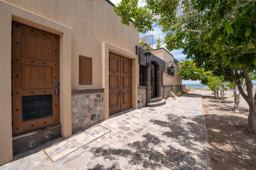Loreto Founders Stunning beachfront residence in Loreto Bay offering luxury, privacy, and direct access to the Sea of Cortez. This exceptional home features distinctive curved architecture, natural stone finishes, and seamless indoor-outdoor living. Enjoy a resort-style pool and elevated hot tub, expansive oceanfront terrace, outdoor kitchen, and multiple entertaining areas with breathtaking sea – Founders 11, Loreto, Loreto, BS