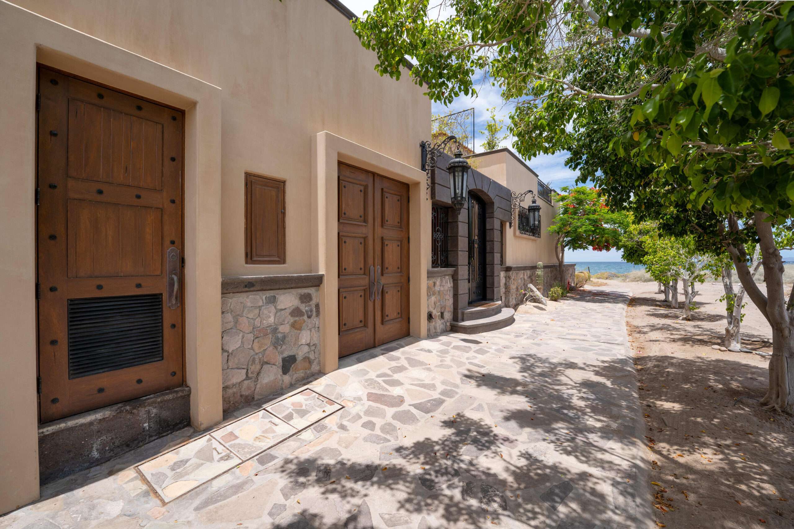 Loreto Founders Stunning beachfront residence in Loreto Bay offering luxury, privacy, and direct access to the Sea of Cortez. This exceptional home features distinctive curved architecture, natural stone finishes, and seamless indoor-outdoor living. Enjoy a resort-style pool and elevated hot tub, expansive oceanfront terrace, outdoor kitchen, and multiple entertaining areas with breathtaking sea for sale
