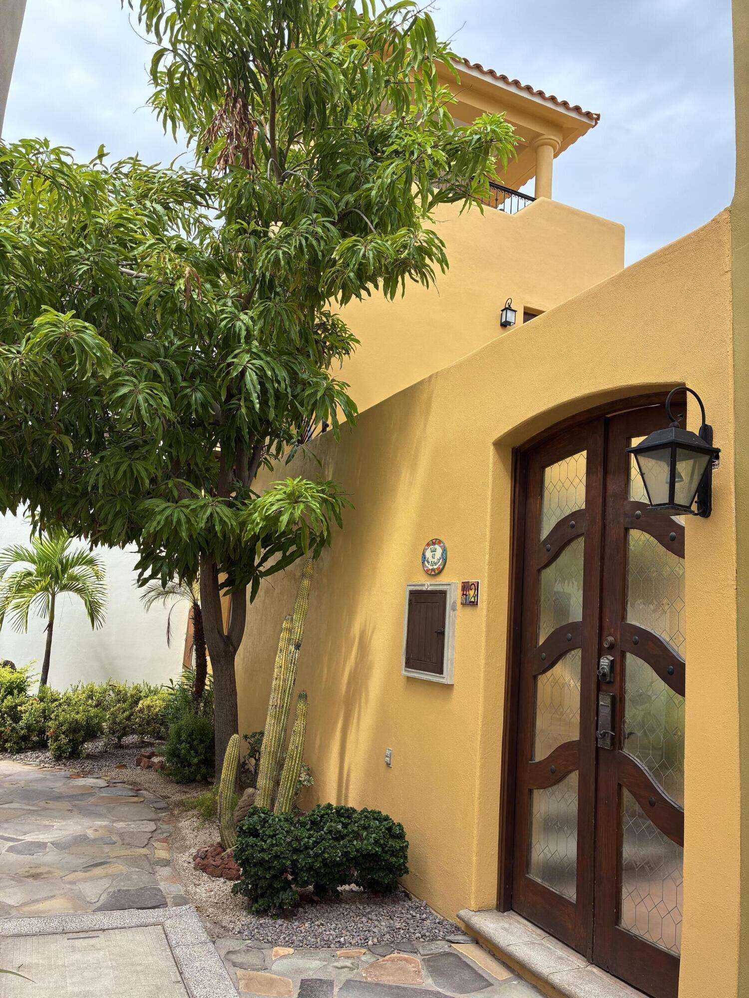 Loreto Founders Founders 262 is a beautifully furnished Poema home in the heart of Loreto Bay, just steps from the beach. This spacious 3-bedroom, 3-bathroom residence offers the perfect blend of comfort and Baja charm, making it ideal as a full-time home, vacation retreat, or rental investment. The thoughtfully designed floor plan features bright, open living spaces that flow seamlessly to multiple outdoor sitting areas, perfect for relaxing or entertaining. Enjoy outdoor dining in the private BBQ area or unwind on the rooftop terrace with beautiful for sale