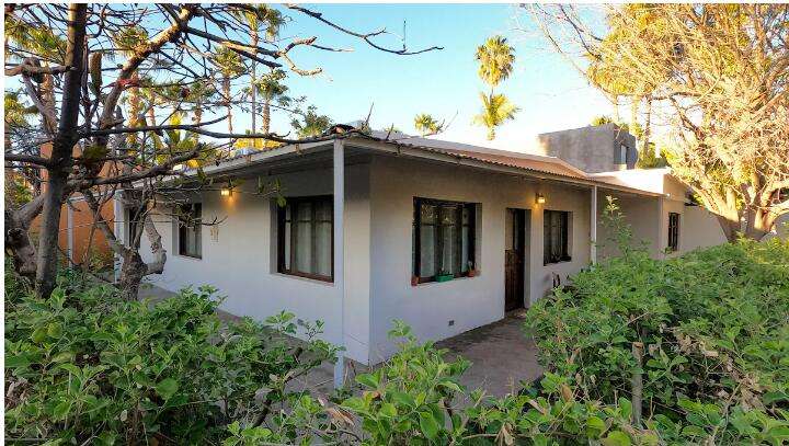 Loreto Centro Experience the true essence of Mexico with this charming 3-bedroom, 2-bath home located in the heart of downtown Loreto. Set on a 300 m² (3,229 sq. ft.) lot and offering 210 m² (2,260 sq. ft.) of interior space, this property blends the character of traditional Baja architecture with everyday comfort, ideal for someone who appreciates the beauty of older homes with a story to tell.The atmosphere throughout the home is peaceful and welcoming. A lovely front porch provides the perfect spot to read, sip your morning coffee, or simply enjoy the slower pace that makes Loreto so special.The patio areas encourage you to embrace the Baja lifestyle.Offers an authentic Mexican experience in one of the most peaceful and historic corners of the city, with cafés, restaurants, and local shops. for sale
